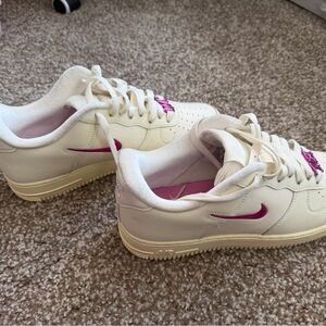 Nike Women’s Low-Top Sneakers — White with Pink Swoosh